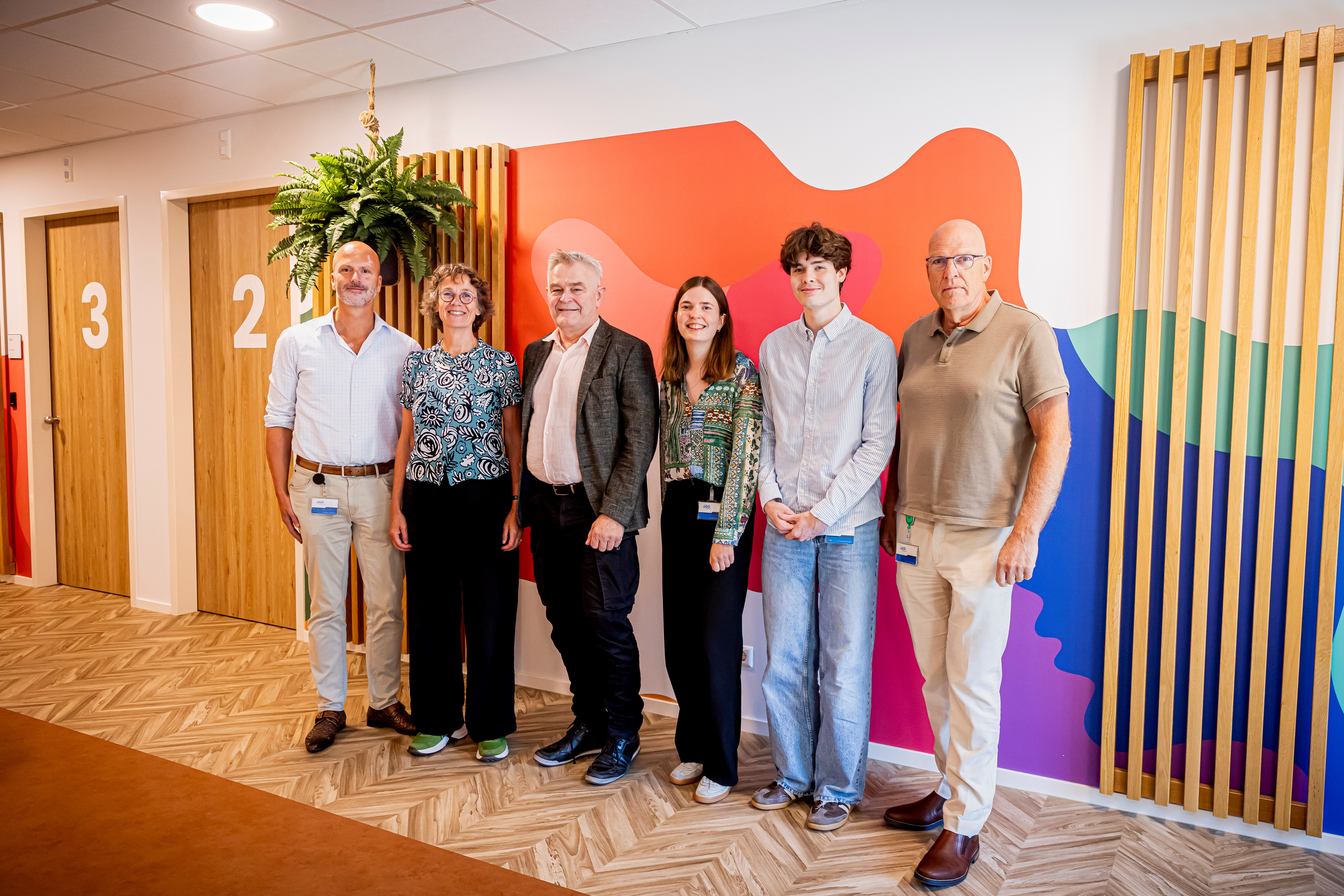 groepsfoto van het mpox team